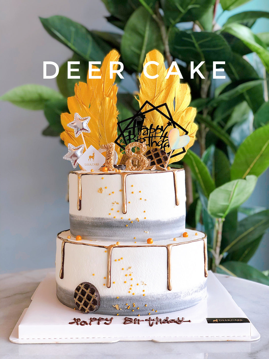 Two tier Golden Feather Birthday Cake