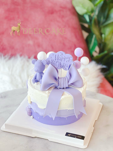 Purple bear with bownot